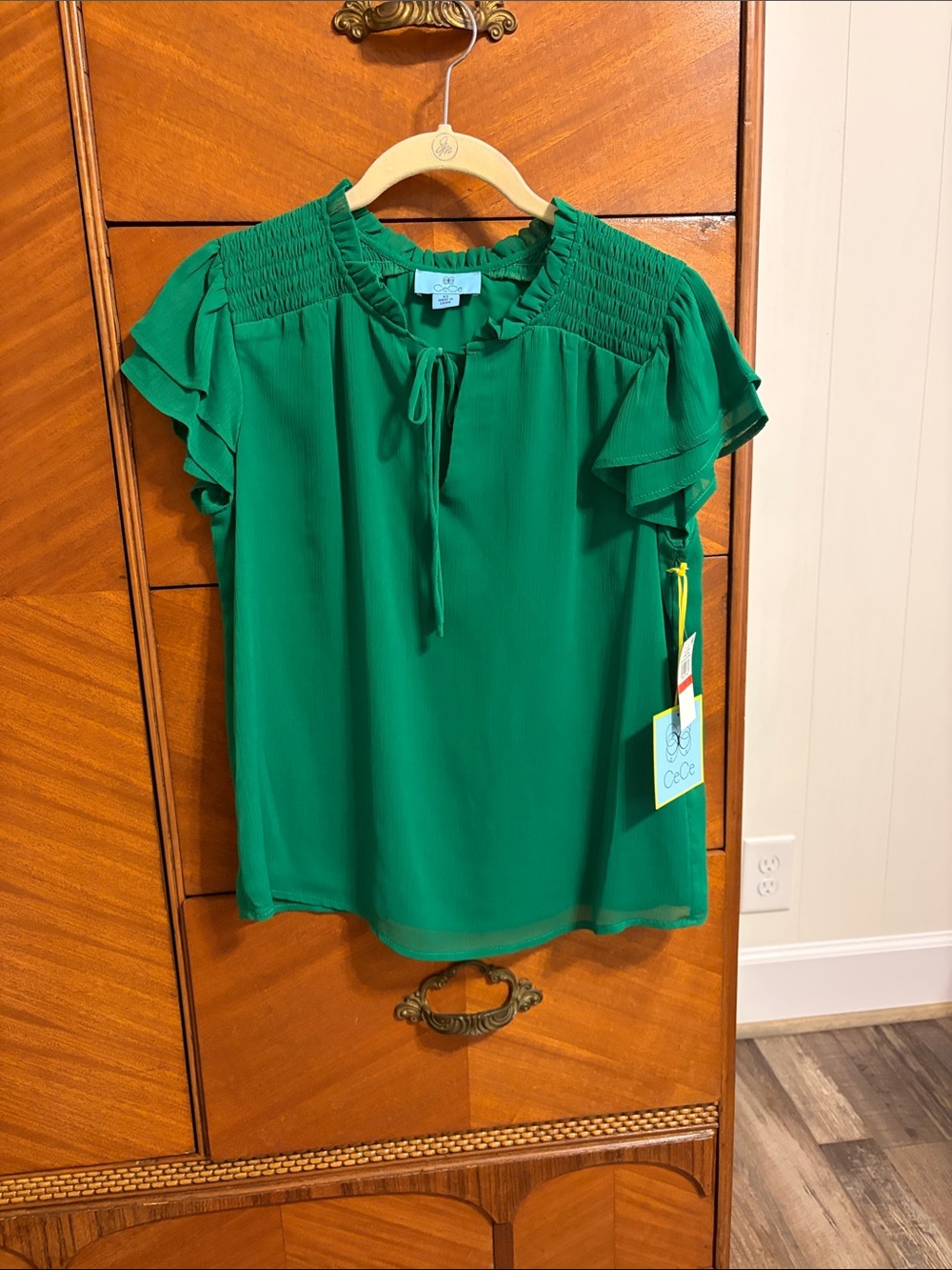 CeCe Puff Sleeve Tie Front Top Size XS 
Color Lush Green